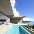 Minimalist Concrete House with Intimate Interior Spaces and Dramatic Habour Views
