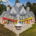 Architectural Work of Art: Postmodern Lakefront Home with Playful Design