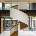 Modernist Glass House in Singapore with a Dramatic Spiral Staircase
