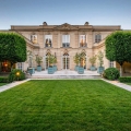 Neoclassical Mansion Surrounded by Beautifully Manicured Gardens