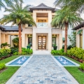 Waterfront Island-Style Home in Naples with Tropical Gardens