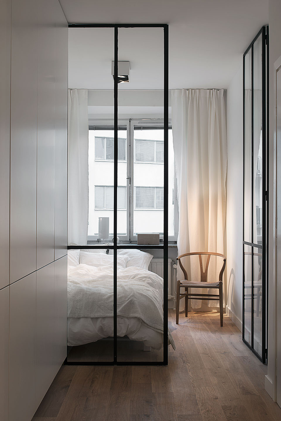 420-Square-Foot-Stylish-Apartment_4 Bedroom with Glass Wall and Glass Door