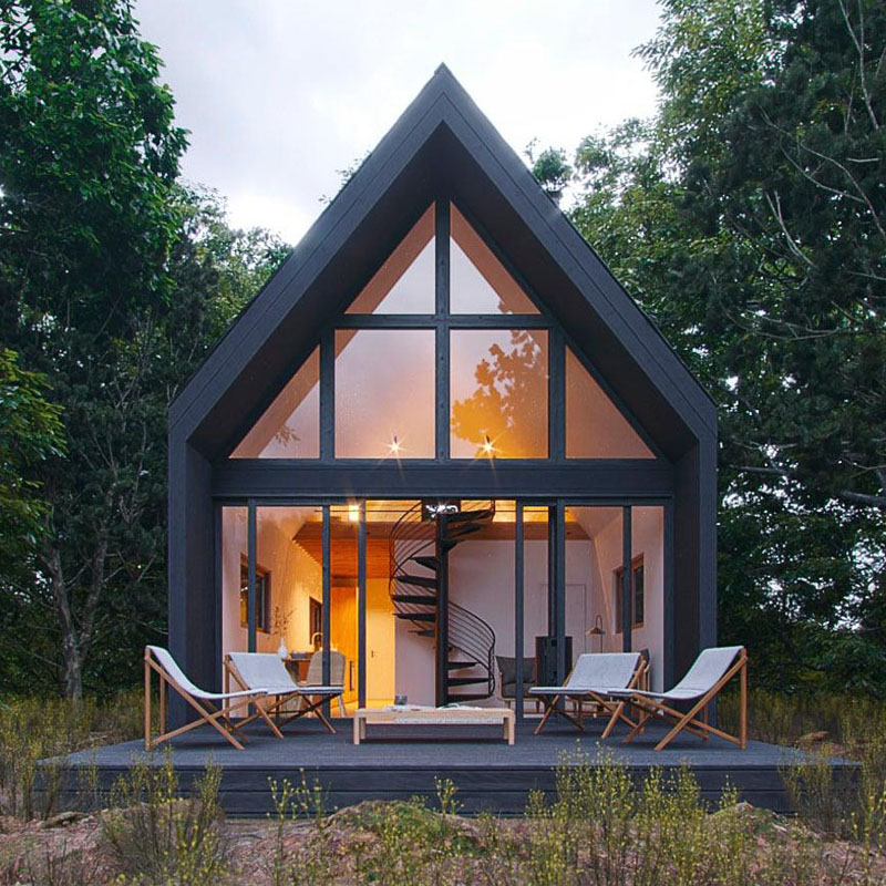 Tiny House in the Woods with Metal Spiral Staircase