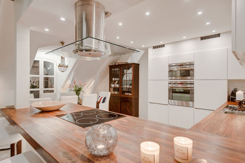 Attic-Duplex-with-Glass-Floor_4 Modern Elegant Kitchen with Wood Countertops