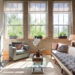 Modern Apartment Uses Merida Roman Grey Parquet Rugs To Connect Living Spaces
