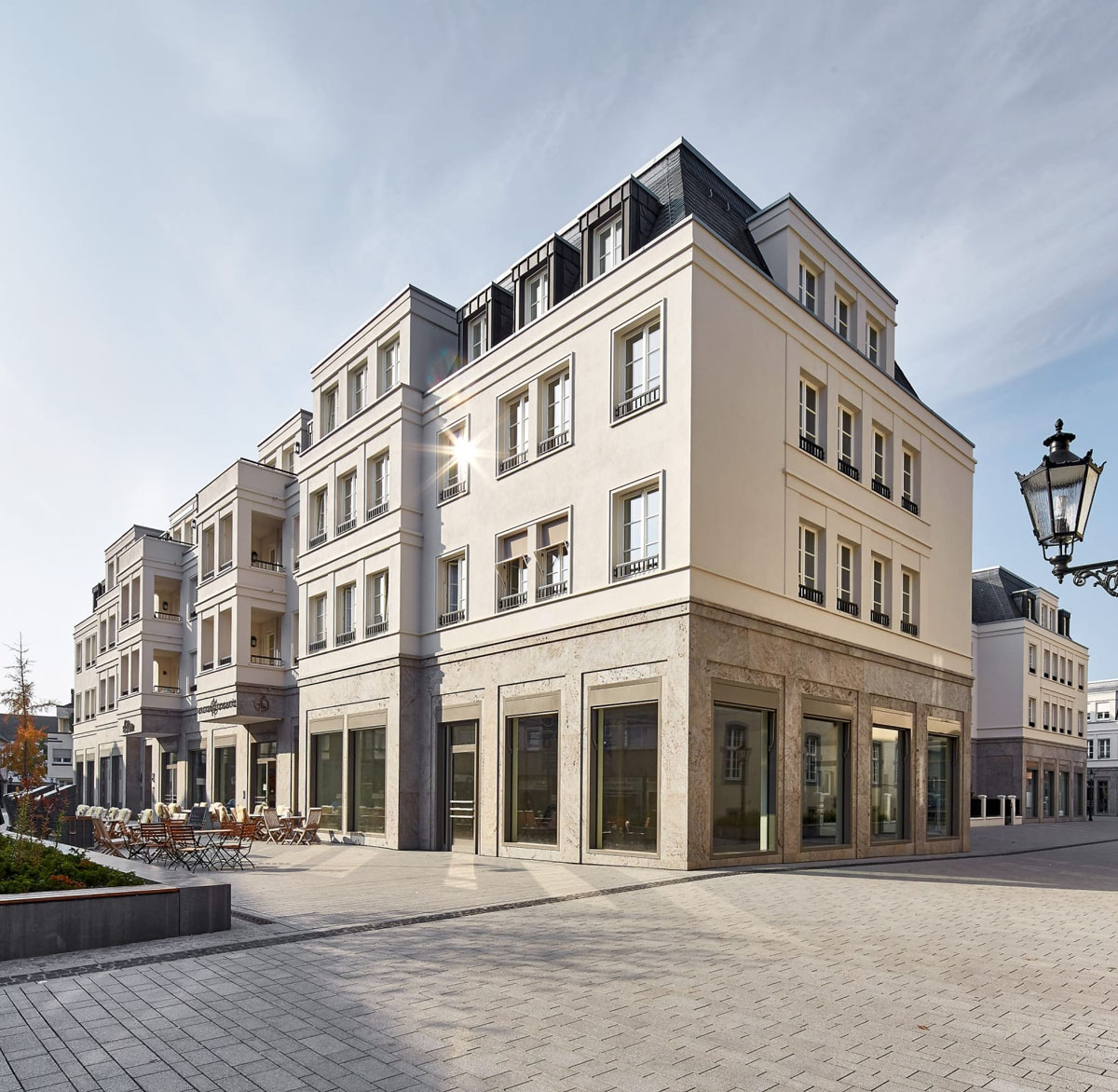 Elegant Residential and Retail Development in Old Town Kempen - Germany Apartment Block with Sidewalk Cafe
