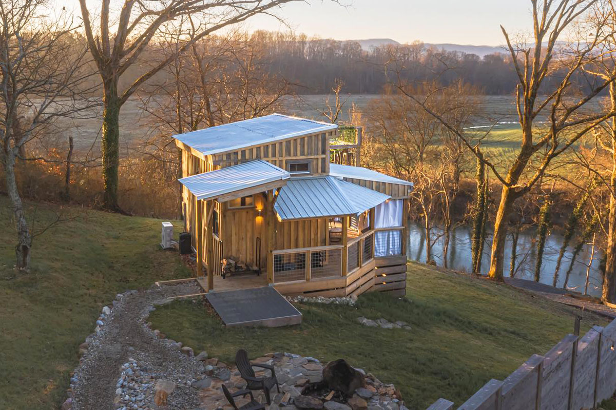 Small Cabin by the River in a Peaceful Setting