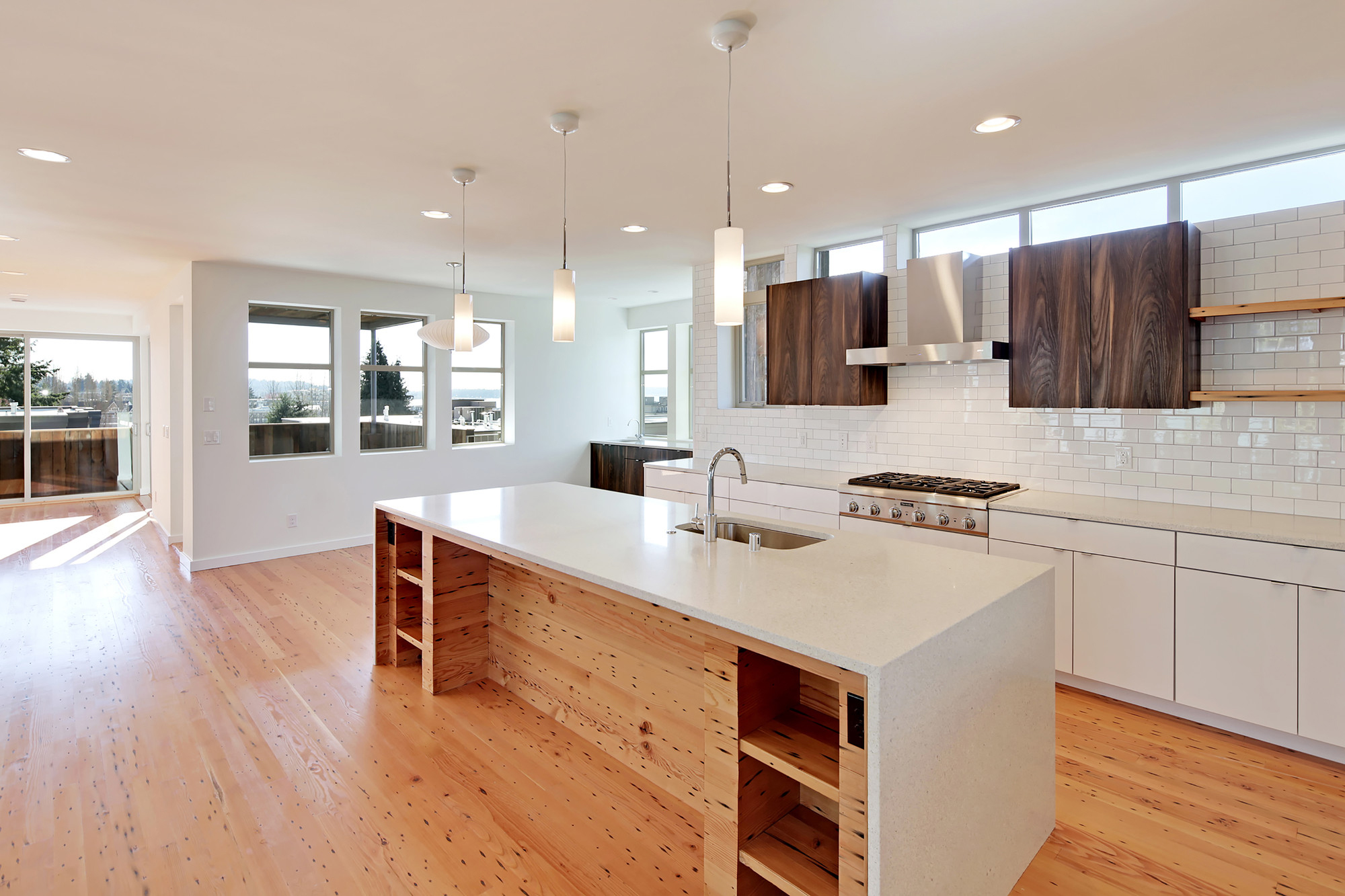 Dwell-Development-Kirkland-Home_10 Modern Kitchen with Wood Shelves and Quartz Countertop