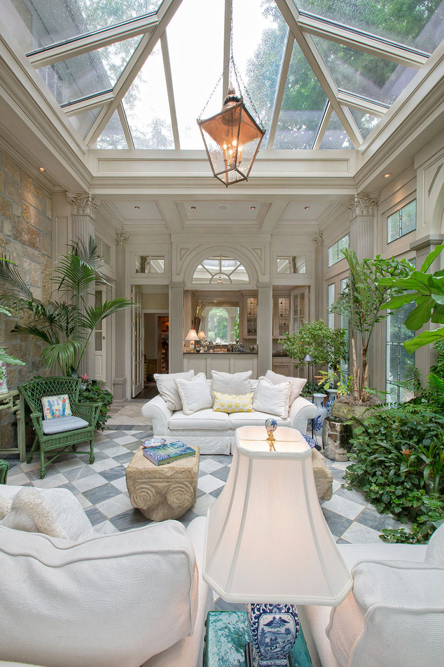 Large Enclosed Marble Floor Sunroom