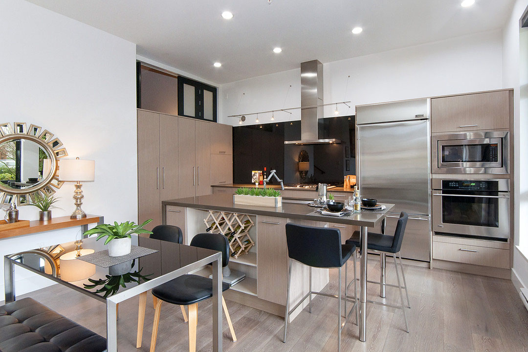 GlassHouse-Modern-Loft-Apartment-New-Westminster_6 Chic Modern Kitchen with Stainless Steel Appliances