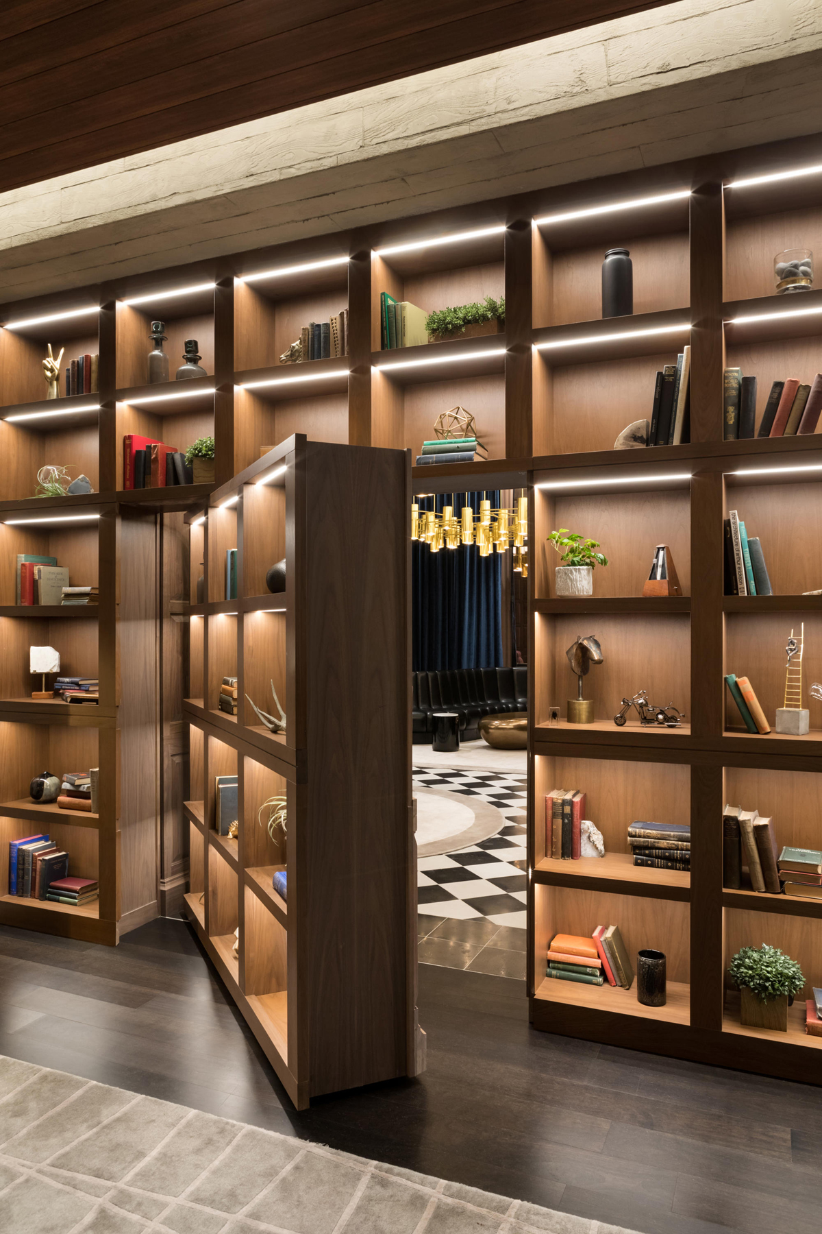 Secret Lounge Hidden Behind a Bookcase at PARQ Vancouver Hotel