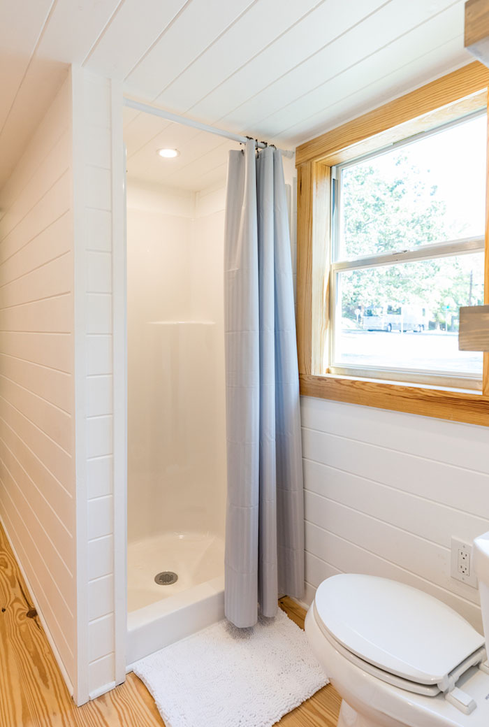 Tiny House on Wheels with Clean Transitional Design