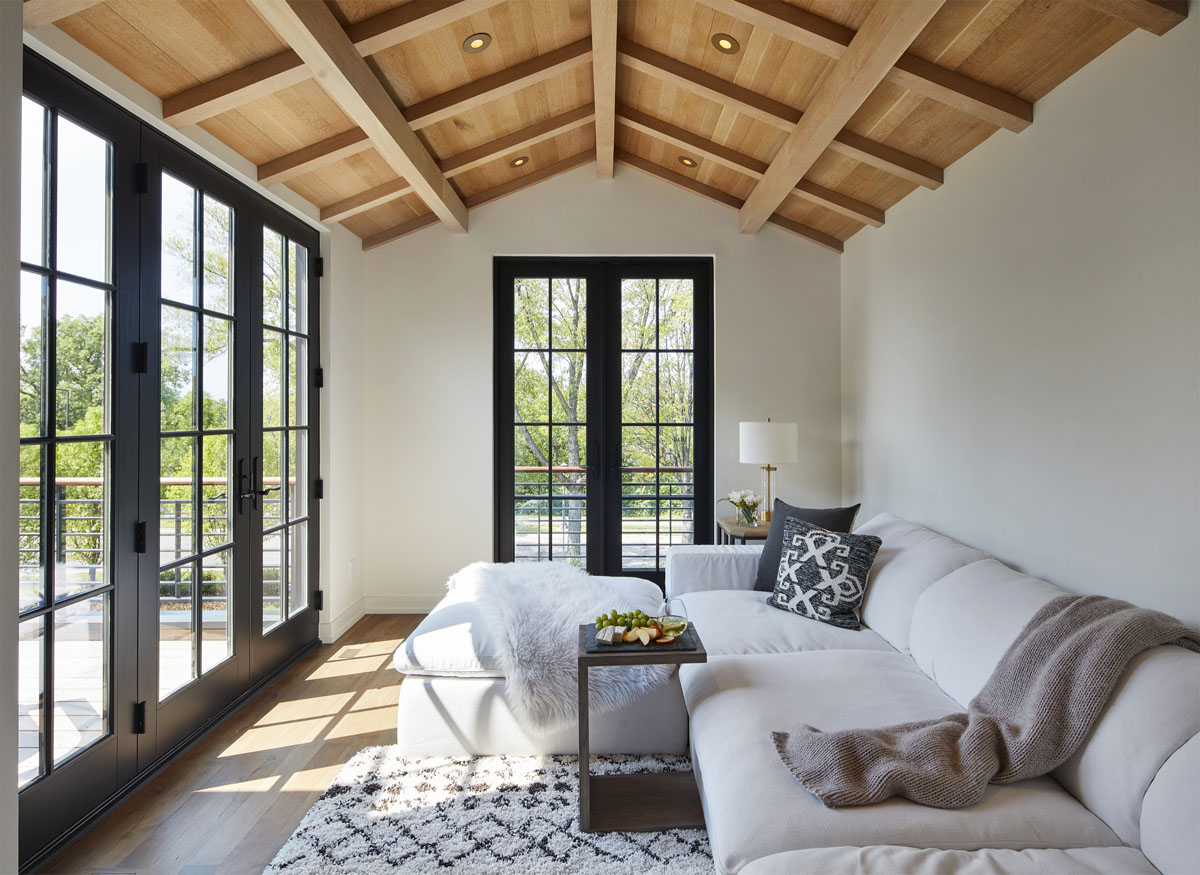 Lounge with Warm White Oak Timber Beams and Paneled Ceiling