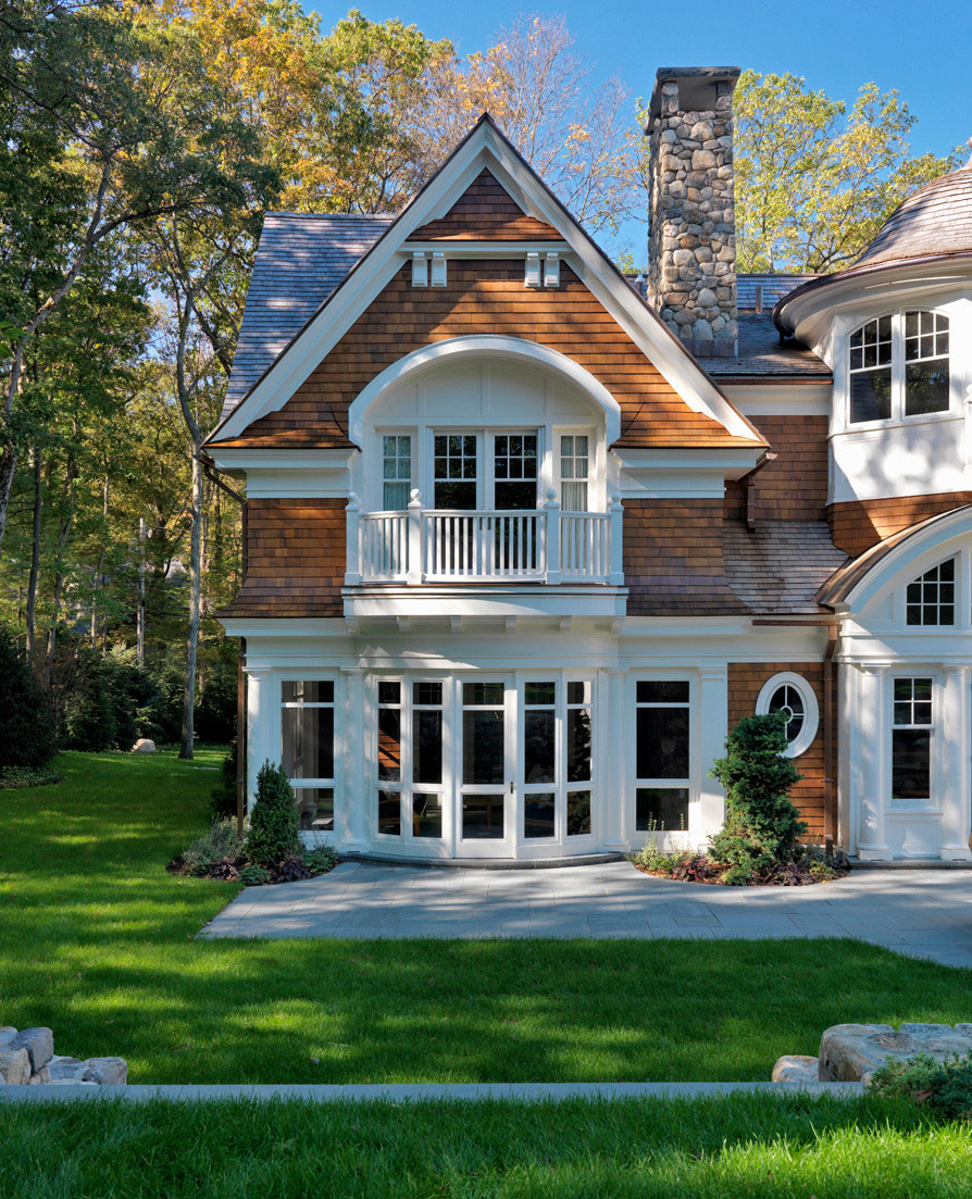 Traditional New England Shingle-Style Home with Palladian Architectural Influence