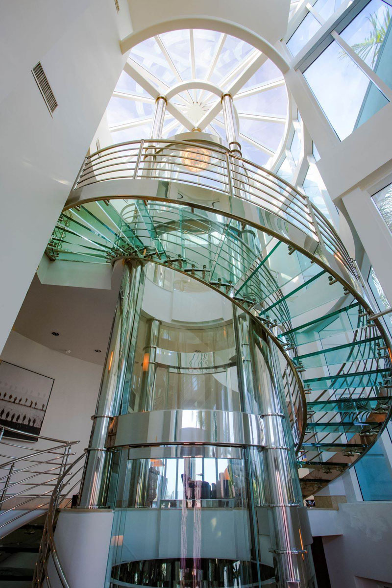 Luxury Waterfront Home with Glass Elevator and Spiral Staircase - St. Petersburg, Florida Circular Glass Elevator and Round Skylight