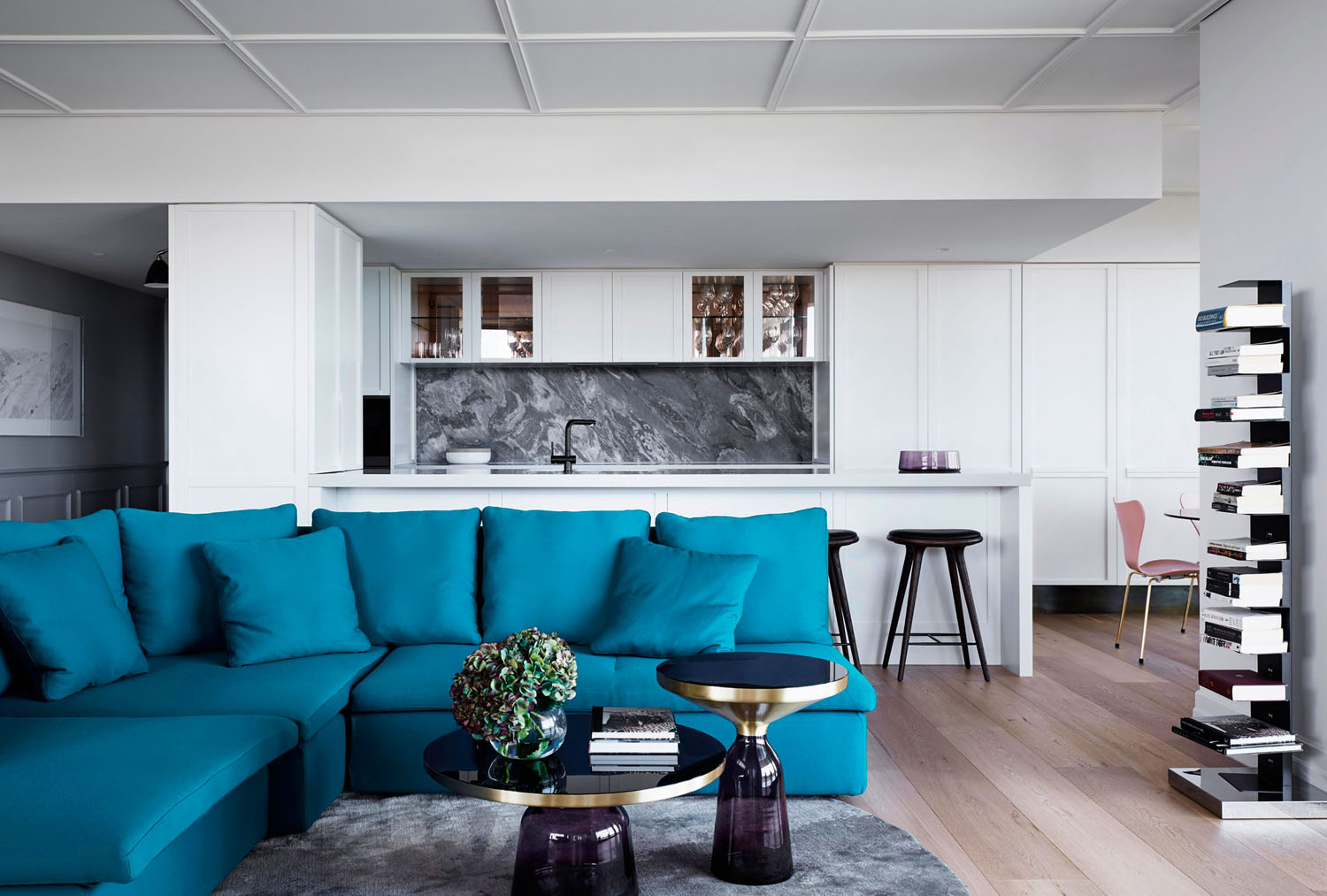 Renovated-Chic-Penthouse-Apartment-Melbourne_1 Elegant Modern Interior Decorating Ideas Blue Sofa and Black and White Backdrop