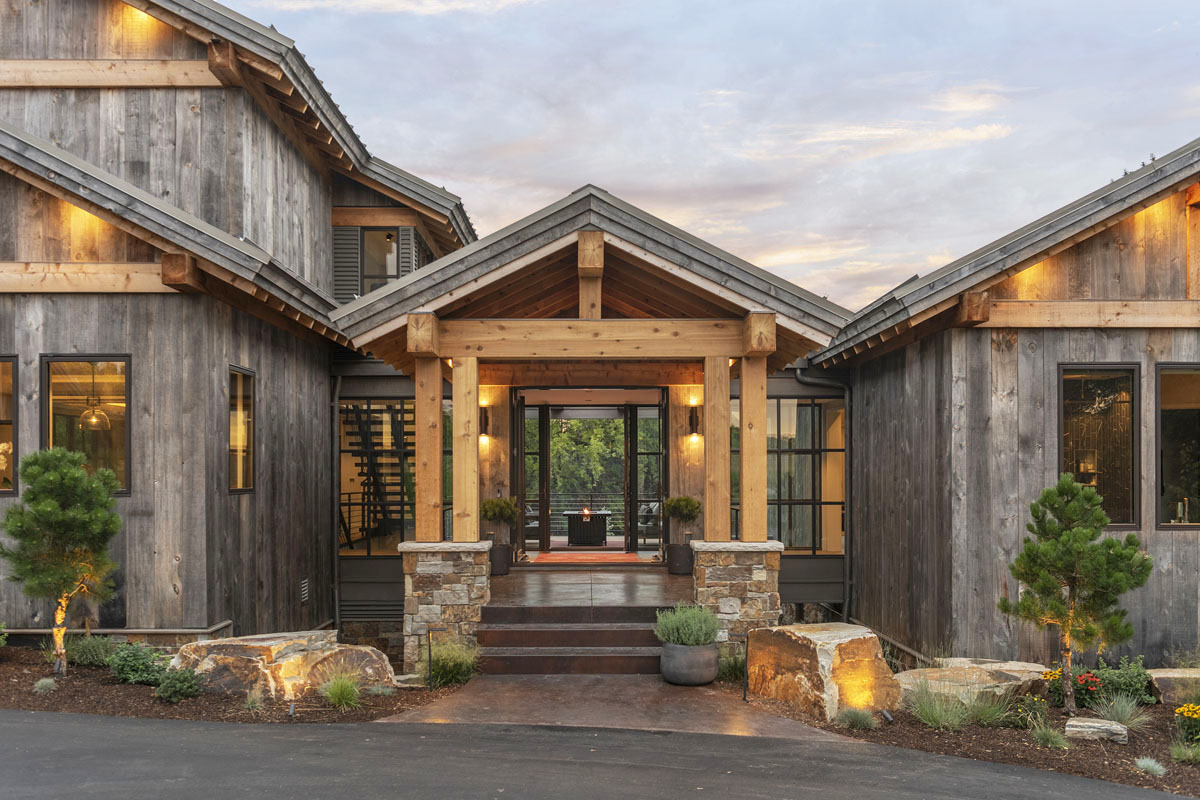 Modern Classic Country Home - Afton, Minnesota Modern Country Lodge Front Entrance with Glass and Metal Bridge