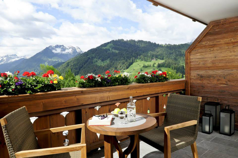 The-Alpina-Gstaad_17 Terrace Balcony with Swiss Mountain View
