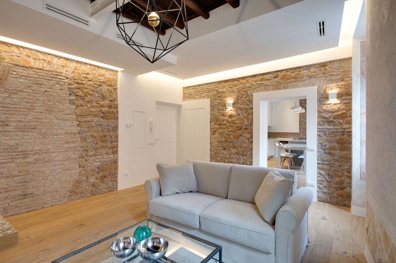 Via-Sistina-Apartment_6 Modern Rome Apartment Living Room with Stone Walls